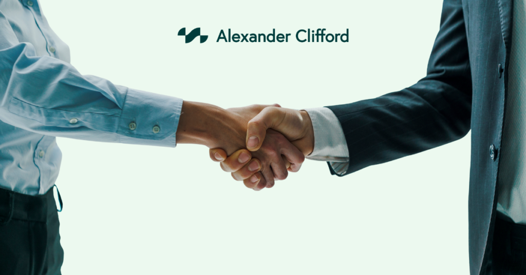 2 Business People Shaking Hands in Agreement