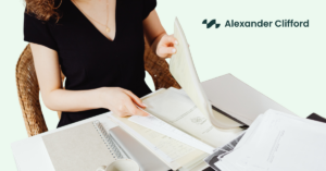 Person organising R&D tax relief claim documents before preparing an HMRC submission