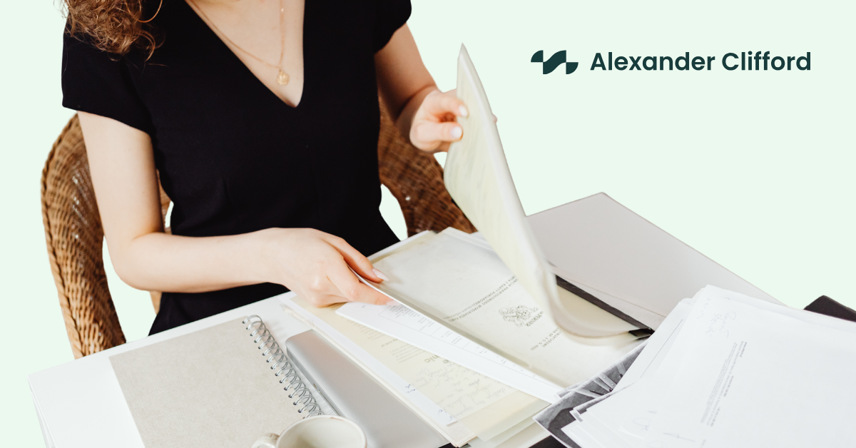 Person organising R&D tax relief claim documents before preparing an HMRC submission